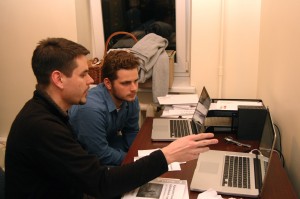 Joshua and Bryan work on grading Bible lessons which we recently received in the mail from some of our students.