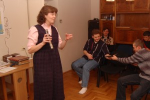Denise tells the group about a trip she took to Africa.