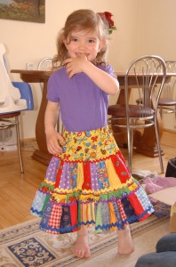 Abby tries on a new skirt that Baba (her grandma) made for her.
