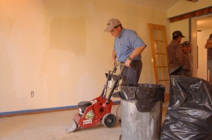 Jerry Balding rented a floor scraper for us and did a great job cleaning off the old glue in preparation for our new floor.